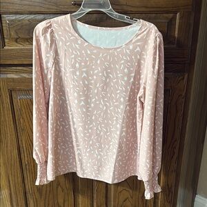 Elegant Pink Blouse with White Patterns